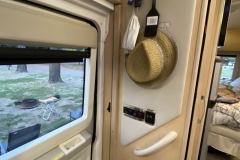 Hooks to hang coats or hats by the door