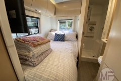 Master Bedroom with foam futon and linens